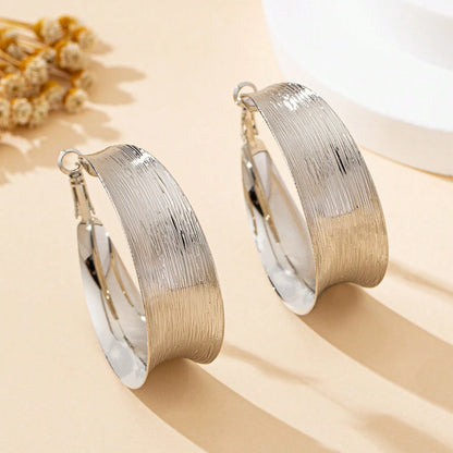 A Pair of Women's Earrings