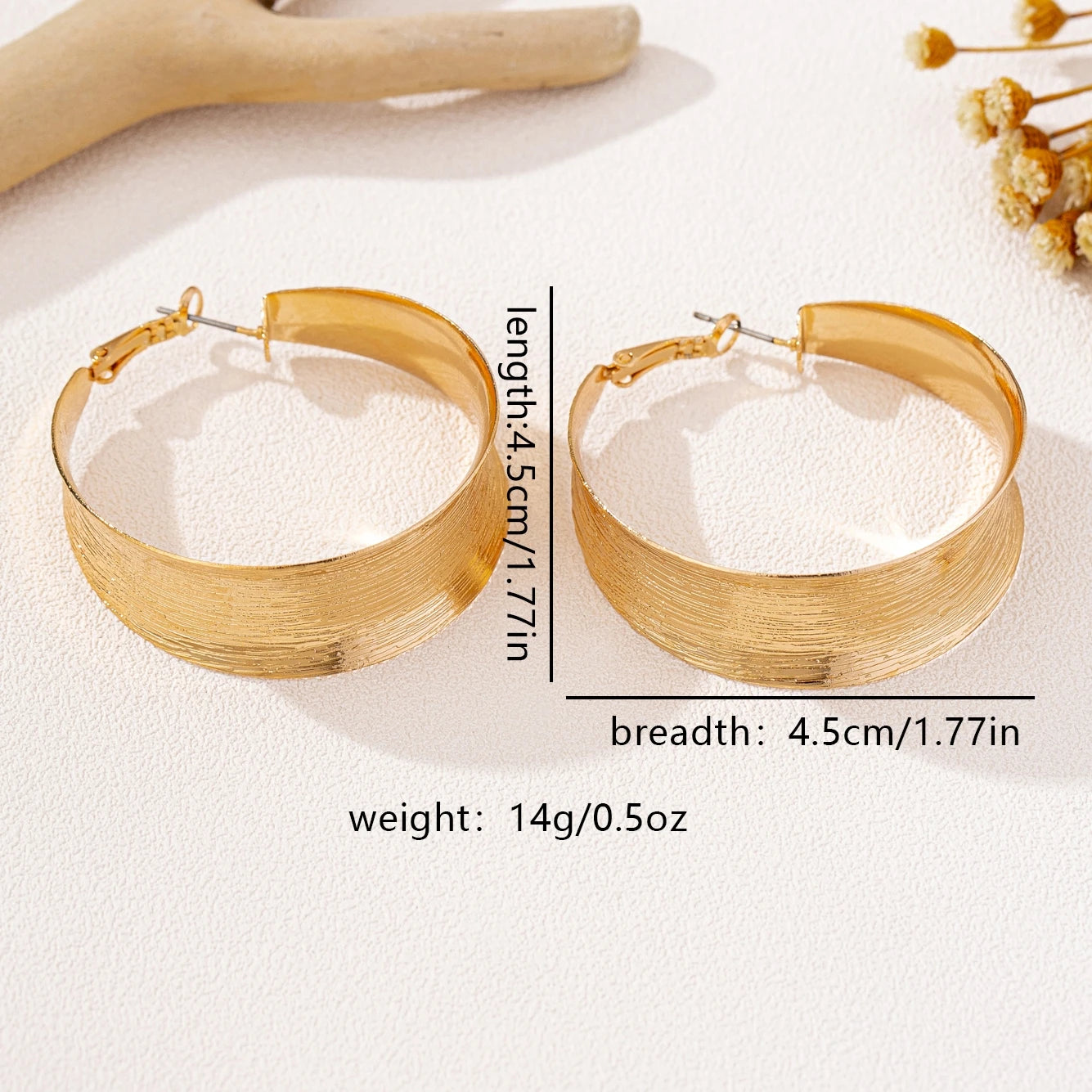 A Pair of Women's Earrings
